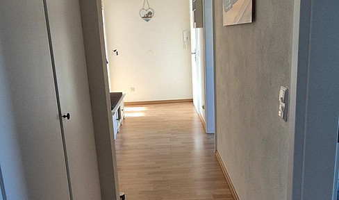 Spacious 3-room apartment with balcony and garage.