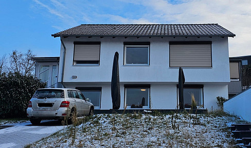 Modern dream home – 2 living units, charming hillside location, and panoramic views.