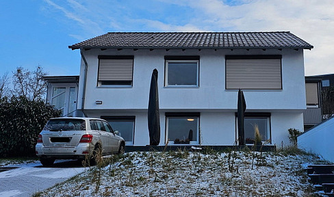 Modern dream home – 2 living units, charming hillside location, and panoramic views.