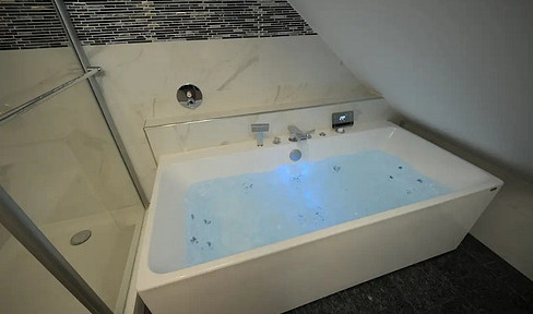 5-room maisonette apartment with a jacuzzi in Munich.
