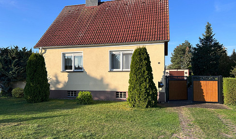 Detached single-family house on a large plot of land.