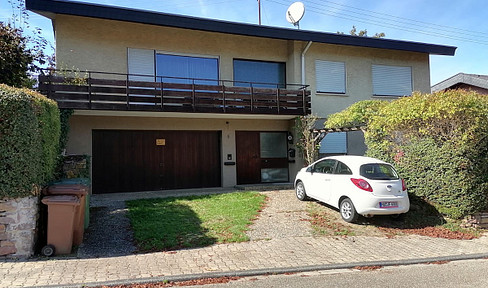 Detached single-family house with a separate apartment.