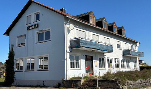 Multi-family house with additional land in Vöhringen.