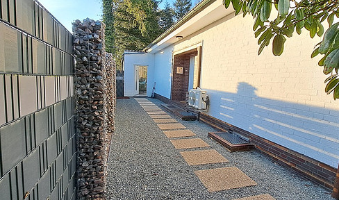 Modernized single-family home with its own forest – stylish living in Horsten.
