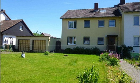 Doppelhaushälfte mit Wintergarten, Kamin, Balkon & Doppelgarage in Hofgeismar – Provisionsfrei von privat!