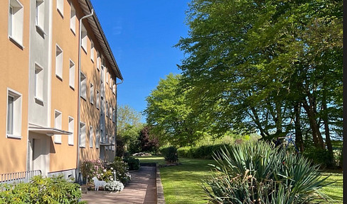 Schöne Vierzimmerwohnung mit Balkon in grün zu verkaufen