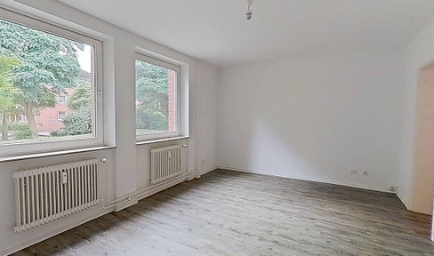 Modern 2-room apartment with fitted kitchen and balcony.