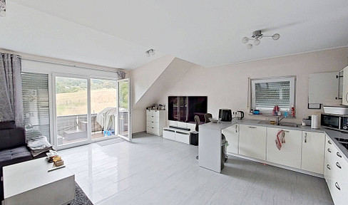 Spacious 3-room apartment with balcony and fitted kitchen in a quiet residential area.