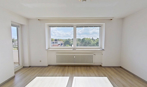 Bright 2-room apartment with fitted kitchen, balcony, and great views.