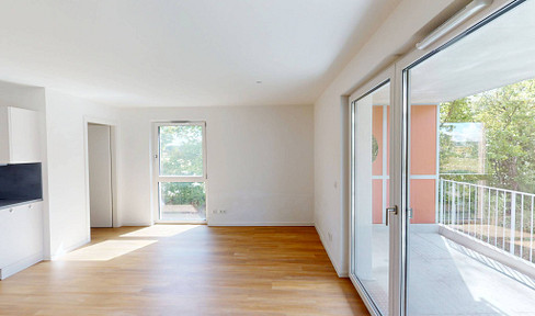 Guaranteed comfort: Bright, newly built 3-room apartment with fitted kitchen and a sunny balcony.
