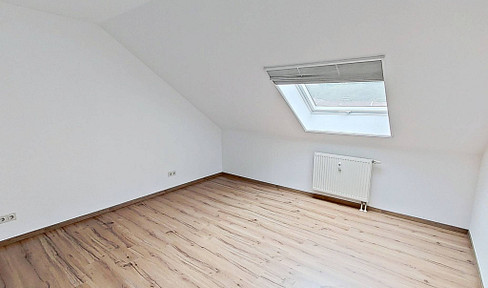 Cozy 2-room attic apartment with a large, bright bathroom.