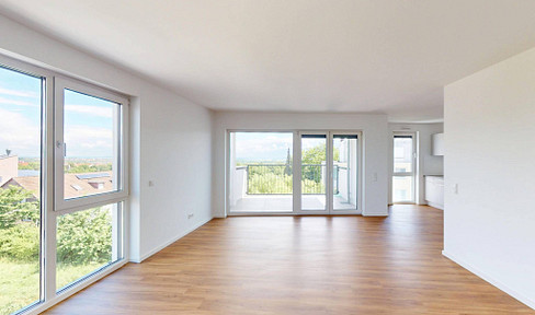 Space and comfort, combined with modern design: Exclusive 3-room apartment with 2 balconies, a fitted kitchen, and 2 bathrooms.