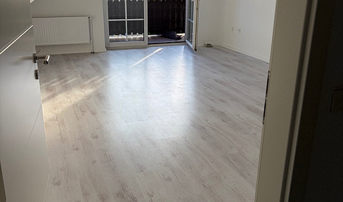 3 Zimmer Wohnung in idyllischer Lage mit Garten und 2 Stellplätzen