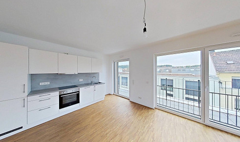 Spacious 3-room apartment with a rooftop terrace and a modern built-in kitchen.