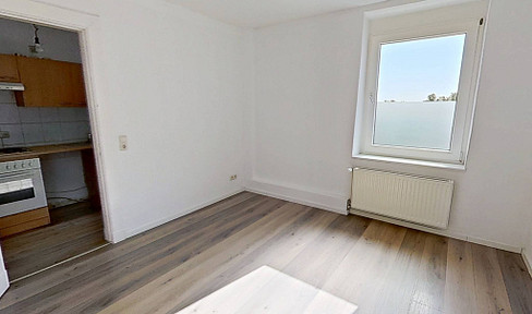 Zentral & ruhig zugleich: Hell geschnittene 2-Zimmer-Dachgeschosswohnung in Neumünster