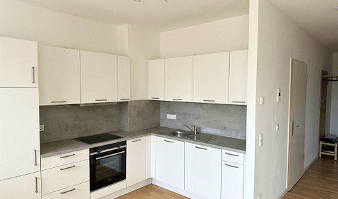 ** Hochwertige 3-Zi.-Erdgeschosswohnung mit EBK, 2 Tageslichtbädern, Terrasse und Gartenanteil **
