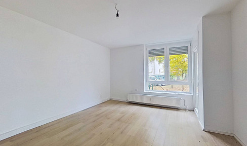 Modern 4-room ground floor apartment with terrace and daylight bathroom in Roding.