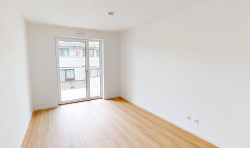 Bright, modern 2.5-room apartment with balcony and fitted kitchen, located within walking distance of the hospital.