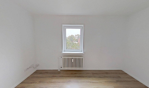 Emden-Herrentor: Cozy 3-room apartment with a bright bathroom.