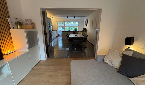 Duplex apartment with a garden, fitted kitchen, and garage, located in Sodingen, Herne.