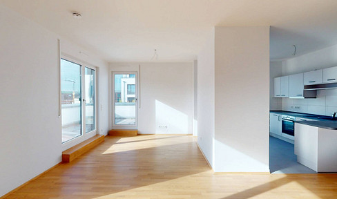 NEW CONSTRUCTION: Spacious one-bedroom apartment with fitted kitchen and rooftop terrace in Berlin-Köpenick.