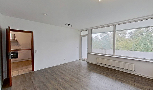Well-proportioned 2-room apartment with a large balcony and fitted kitchen in the Weiche district of Flensburg.