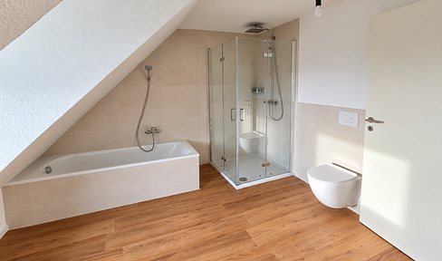 Completely renovated single-family house with 143 square meters of living space, a large garden, and a double garage.