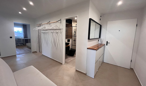 High-quality renovated 3-room apartment with mountain views, 2 balconies (south/west-facing), underground parking space, and an additional toilet.