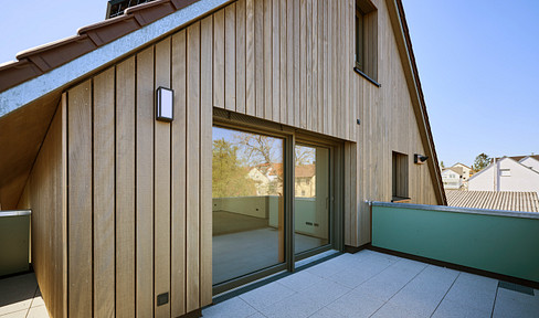 Klimafreundliches Mehrfamilienhaus