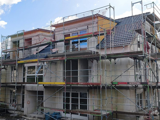 New construction: 4-room, barrier-free ground-floor apartment with two terraces, excellent features, and KfW 55 standard.