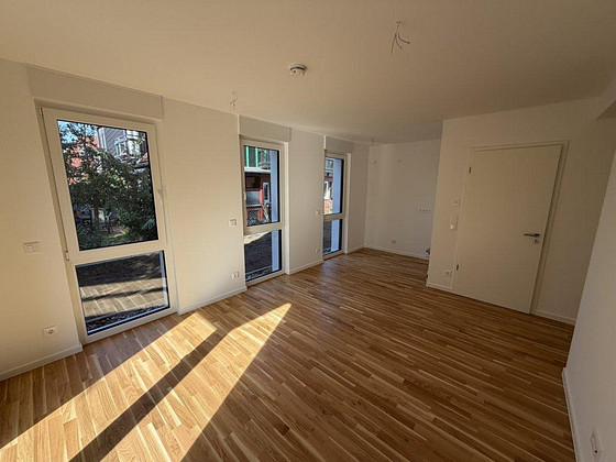 Your new home in a green setting: Newly built 2-room apartment with a garden.