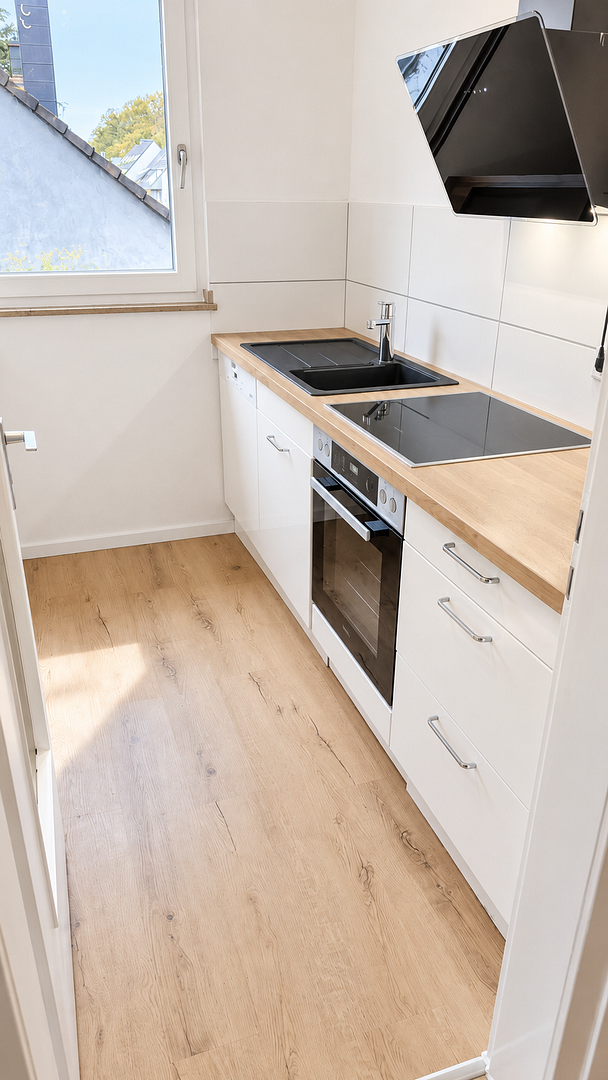 2-Zimmer-Wohnung in Düsseldorf-Unterbach mit Einbauküche in ruhiger Lage – Foto 9