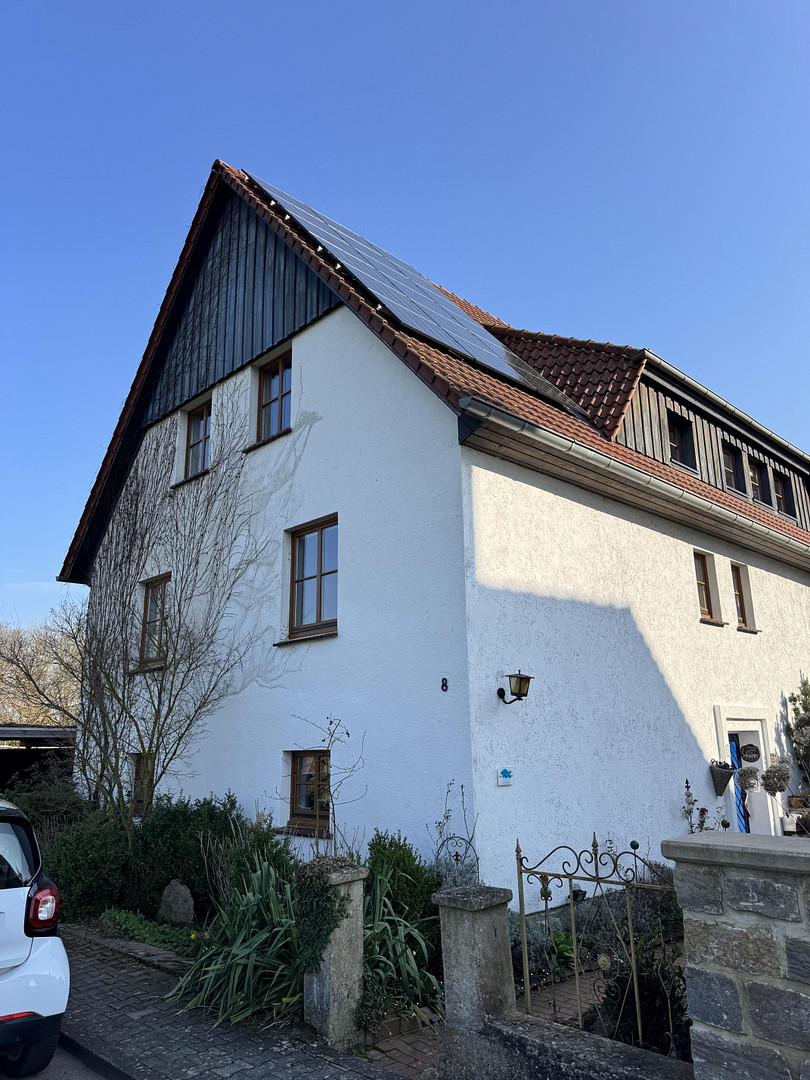 Großzügiges Familienhaus mit Wärmepumpe, PV-Anlagen, Garten und Einliegerbereich in Warburg – Muddenkamp 8, 34414 Warburg(Germete) – Vorschaubild 2