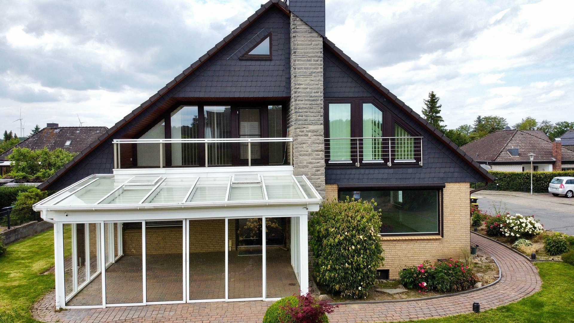 Exklusives Einfamilienhaus mit Panorama-Wintergarten, Sauna, Pelletheizung & Traumgarten in Melbeck