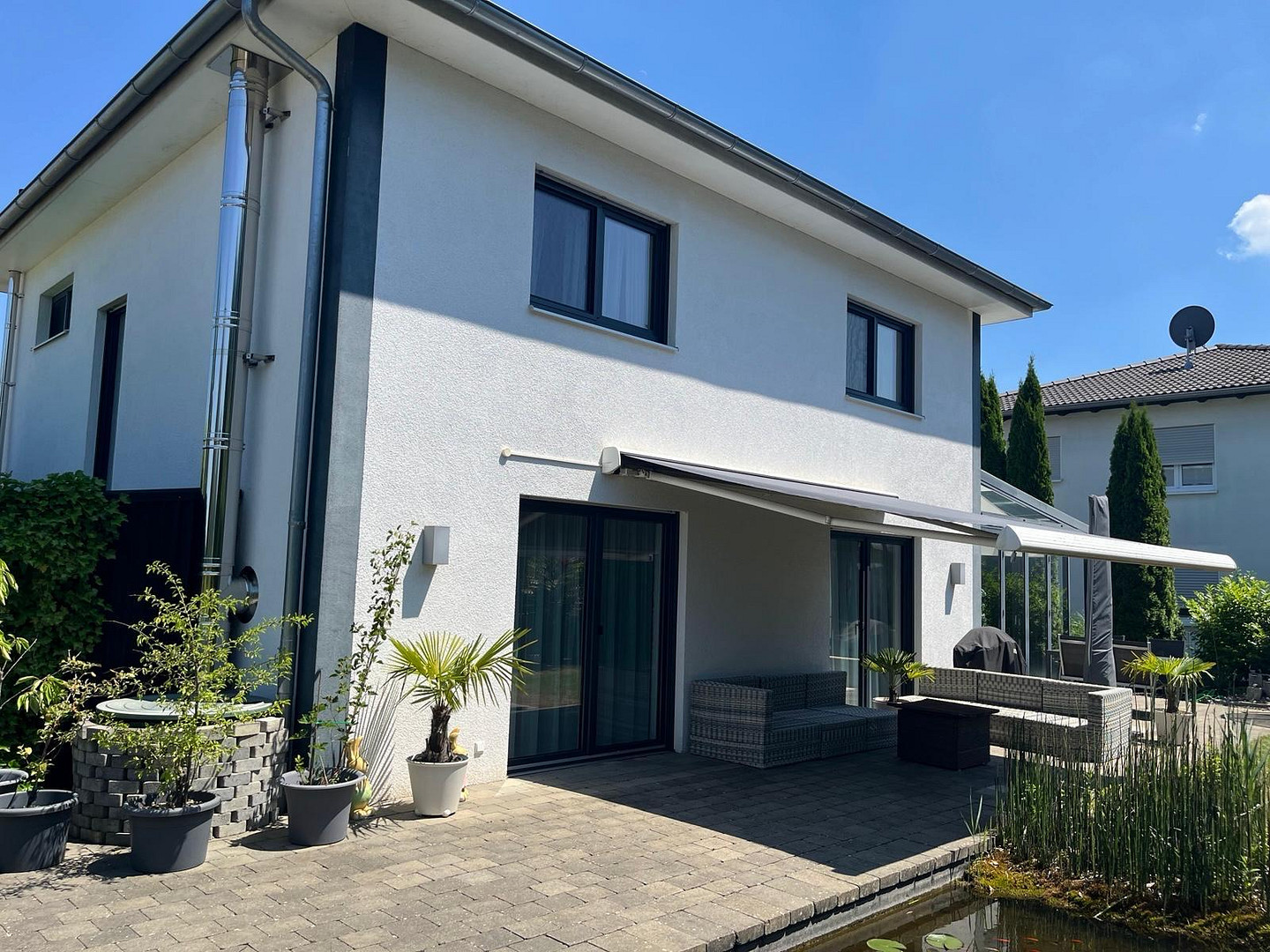 Modernes Einfamilienhaus mit Wintergarten, Doppelgarage und liebevoll angelegtem Garten in Schwendi – Schwendi – Vorschaubild 4