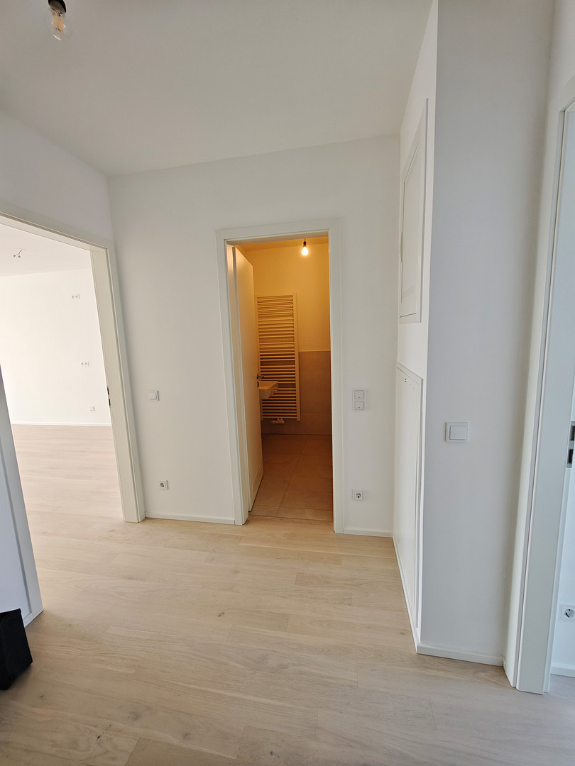 2 Zi-Wohnung Erstbezug ab 1.11. fußläufig 8 min zu U-und S-Bahn – Foto 9
