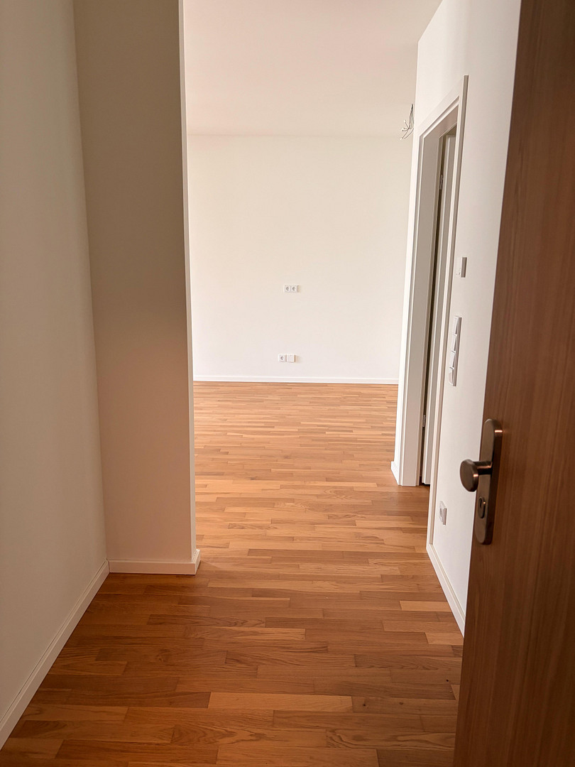 Erstbezug: Lichtdurchflutete 3-Zimmer-Wohnung mit Balkon & Loggia – Foto 2